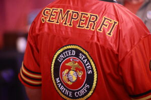 A close up of the semper fi logo on a jacket