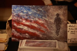 A painting of an american flag and soldier.