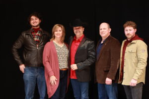 A group of people standing next to each other.