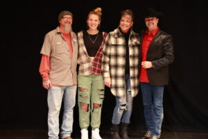A group of people standing next to each other.