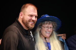 A man and woman posing for the camera.