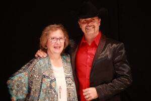 A man and woman posing for the camera.