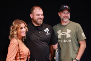 A group of people standing next to each other.