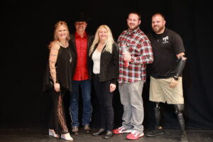 A group of people posing for the camera.