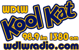 A blue and yellow logo for the radio station